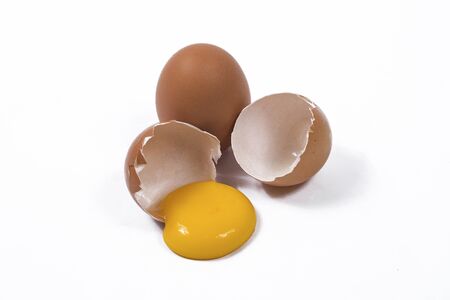 Broken egg isolated on white backgroundの写真素材