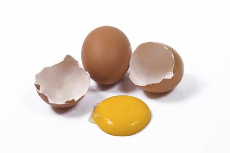 Broken egg isolated on white backgroundの写真素材