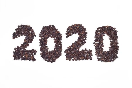 Numeral 2020 from coffee beans, isolated on white backgroundの写真素材