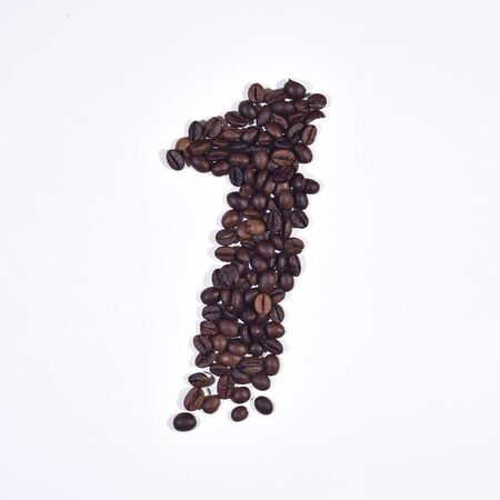 Numeral 1 from coffee beans, isolated on white backgroundの写真素材