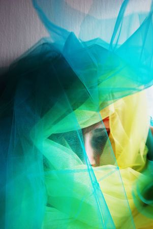 a girl hiden in a tulle
