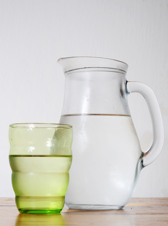 jug and glass of cold waterの写真素材