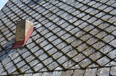 old roof and chimney detailの写真素材
