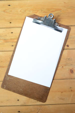 Clip board with blank paperの写真素材