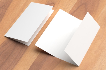 Thrifold - Three fold brochure mock up on wooden background. 3d illustratingの写真素材