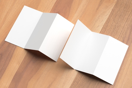 Thrifold - Three fold brochure mock up on wooden background. 3d illustratingの写真素材