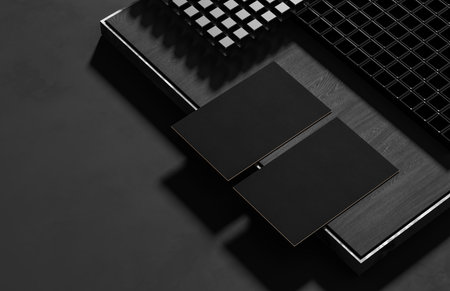 Black business card mock up isolated on dark background. 3D illustrationの写真素材
