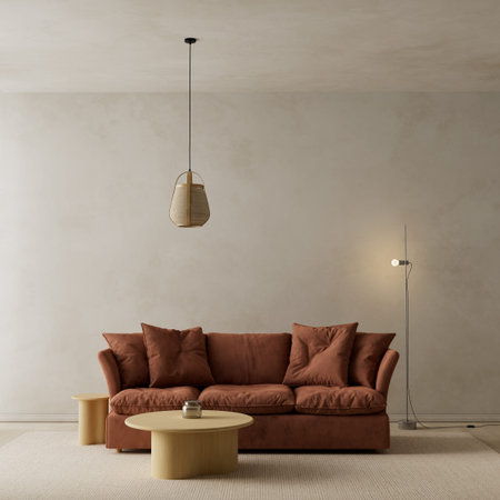 Brown sofa living room interior in warm neutral minimalist apartment with round wooden coffee table...
