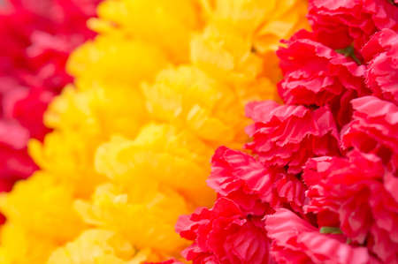 Red and yellow fabric flower stripeの写真素材