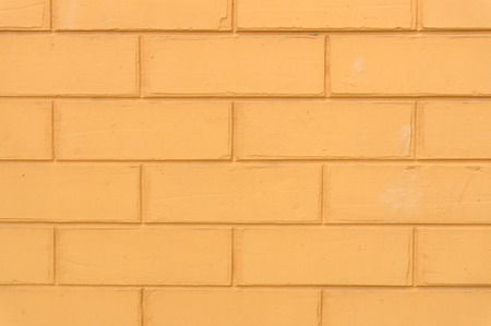 The reddish yellow brick wall textureの写真素材