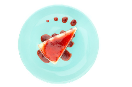 Mille crepe cake with strawberry sauce on white background with copy space.Selecitve focus.の写真素材