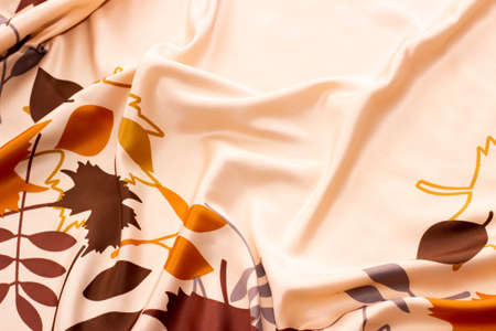 gold texture of fabric in beautiful floral pattern for background