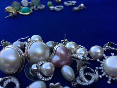 A pile of jewelry. Beautiful woman accessories in vintage style.の素材