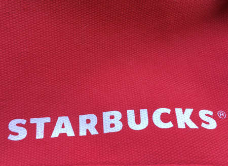 Star bucks logo on fabric surfaceの素材