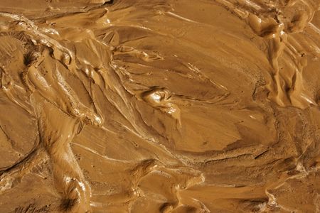 a close-up pattern of mud after heavy rainの写真素材