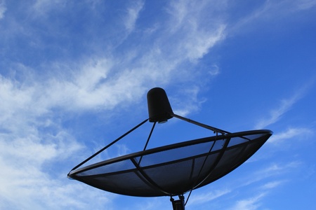 Satellite dish in skyの写真素材