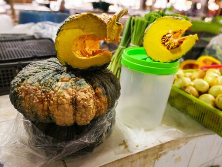Pumpkin fruit sold at domestic market, Thailand Sold as a single ball and cutの写真素材