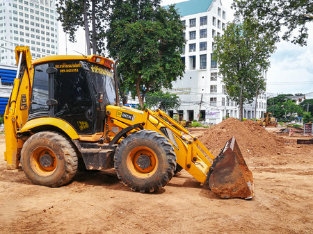 Khon Kaen, THAILAND - July 7, 2018: Yellow dozer parked on the construction site.