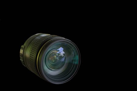 camera lens isolated on black background.の写真素材