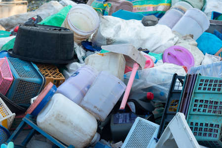 Piles of plastic waste are waiting to be sold for recycling.の写真素材