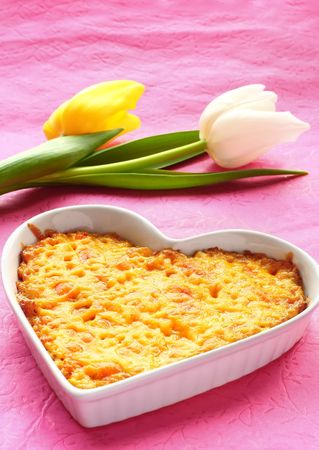 Chicken and cheese gratin in baking dish の写真素材