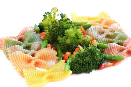 pasta farfalle tricolore with asparagus, broccoli and nutsの写真素材