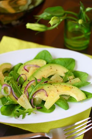 Avocado salad with pineapple and red onionsの写真素材