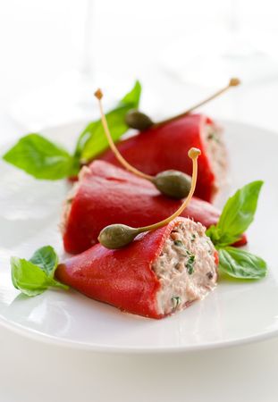 Tasty grilled peppers stuffed with tuna and topped with capersの写真素材