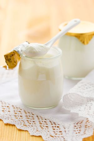 milk yogurt in a glass jar の写真素材