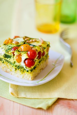  slices of vegetable gratin(quiche) with zucchini,tomato cherry and riceの写真素材