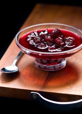 homemade cherry jam in a small glass pedestal bowlの写真素材