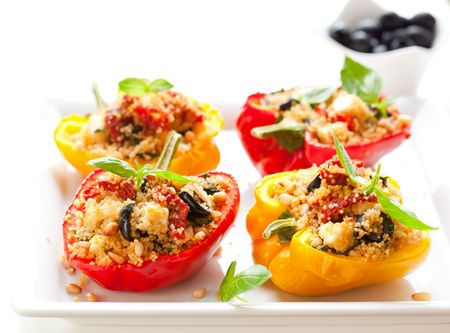 stuffed peppers with couscous, dried tomatoes and fetaの写真素材