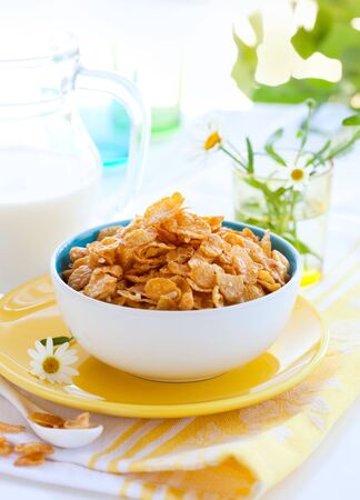 bowl of cornflakes with milkの写真素材