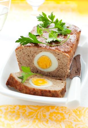 baked meatloaf with boiled eggs for Easterの写真素材