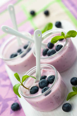 fresh fruit yogurt with blueberriesの写真素材