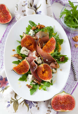 salad with fig,blue cheese,prosciutto and nutの写真素材