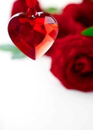 Valentine heart and red rosesの写真素材