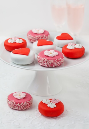 Sweet Valentine Petit Fours on a cake standの写真素材