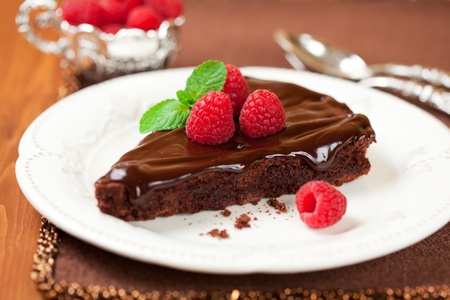 slice of chocolate cake with raspberryの写真素材