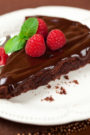 slice of chocolate cake with raspberryの写真素材