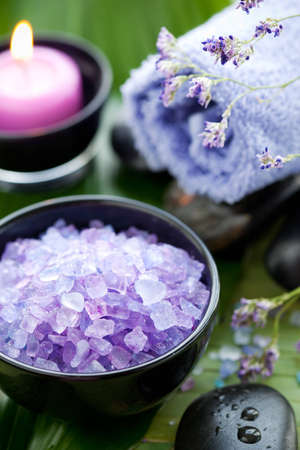 Spa still life .Bath salt,candle,towel and stoneの写真素材