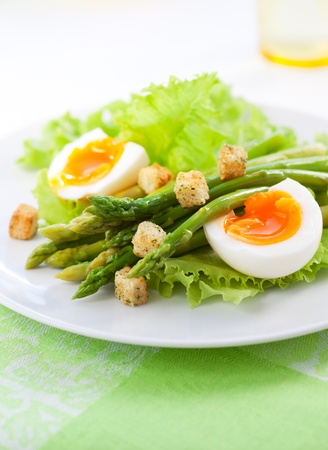fresh salad with asparagus,eggs and croutonsの写真素材