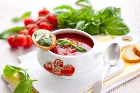 Tomato soup with basil pestoの写真素材