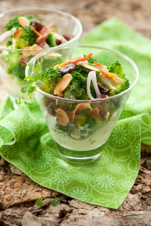 broccoli salad with almond,raisins,onion and baconの写真素材