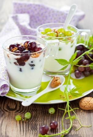 grape dessert with amaretti biscuits in glassesの写真素材