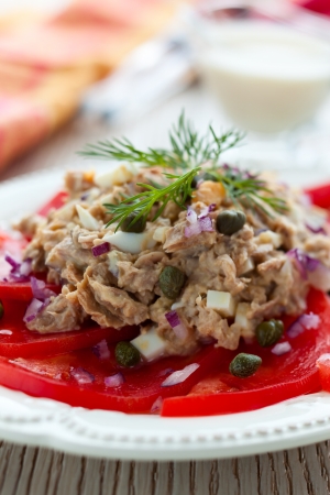 Tuna salad with eggs,capers and tomatoの写真素材
