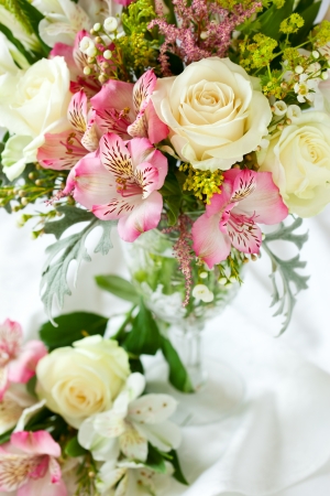 A festive  bouquet in a vase on the tableの写真素材