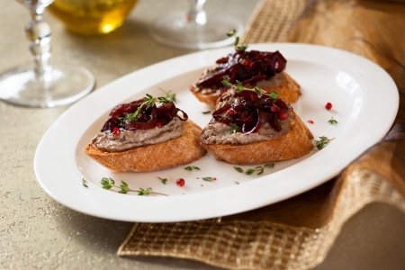 Canapes with chicken liver pate and onion chutneyの写真素材
