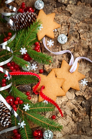 Christmas decirations and cookies on wooden backgroundの写真素材