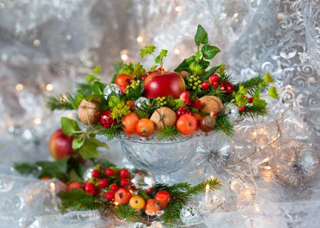 Christmas table decoration with fruit, nuts, fir branchesの写真素材